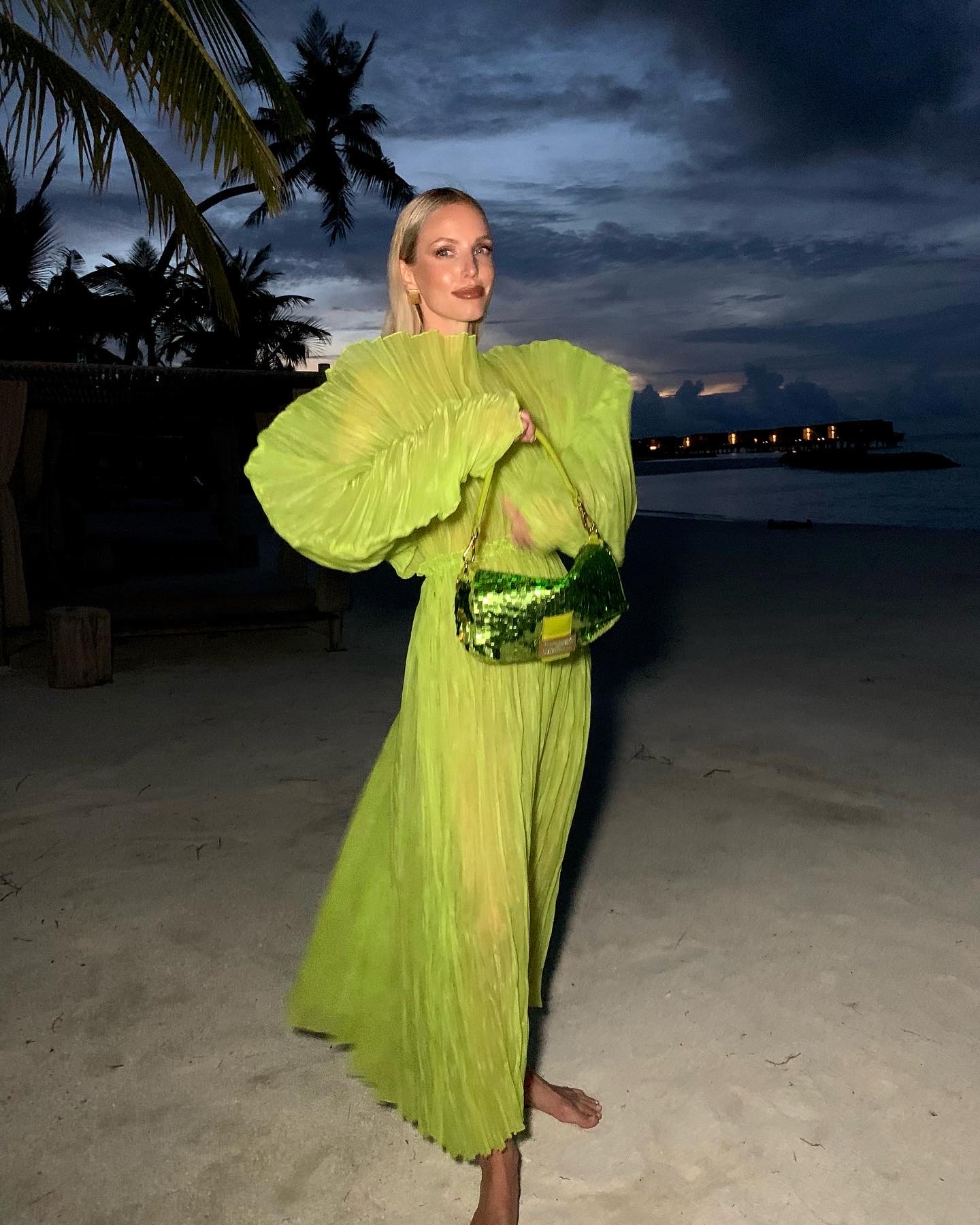 Green dress with Fendi bag